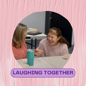 picture of two women laughing at a women's Bible study with words "laughing together"