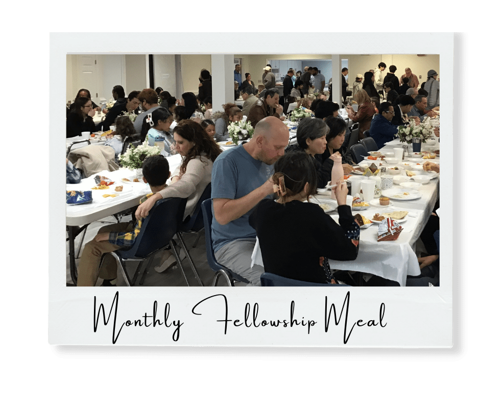 photo of fellowship meal at emmanuel church, fellowship hall full of people enjoying a home-cooked meal together