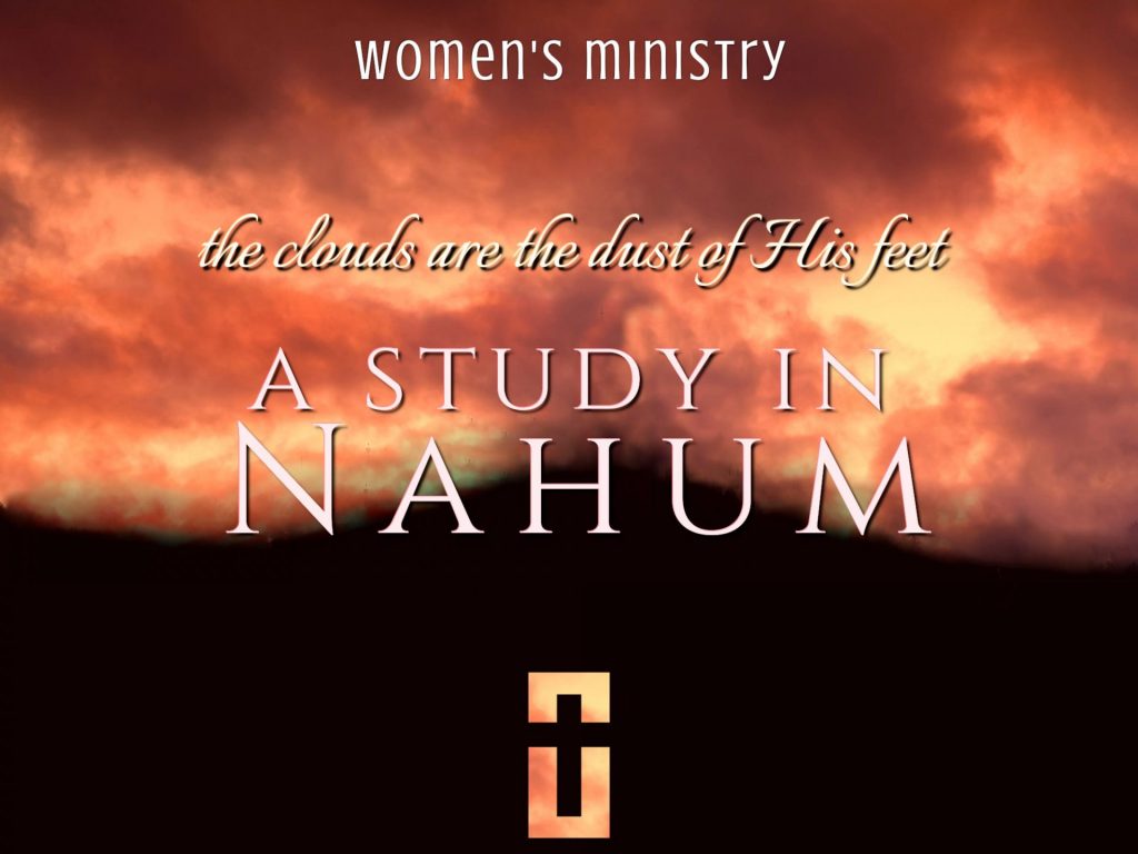 dark mountain in silhouette with cloudy sky in bright oranges, says "Women's Ministry, "the clouds are the dust of His feet", a study in Nahum." This is the theme image for the Nahum study for the Manassas Women's Ministry at Emmanuel.