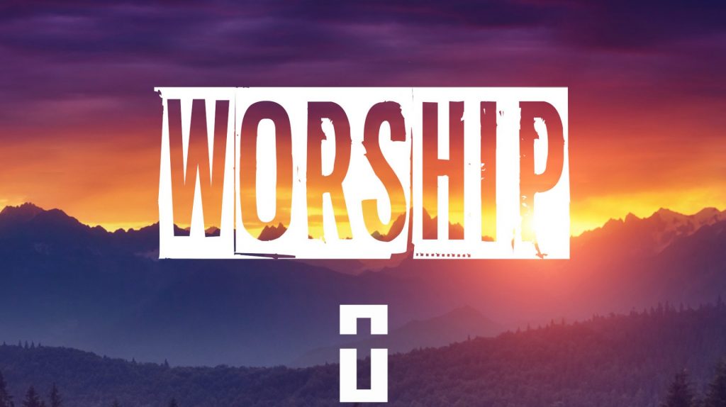 mountain sunrise with "WORSHIP" superimposed over it
